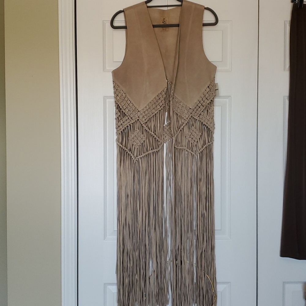Free People tan suede fringe vest size large, new without tags.
